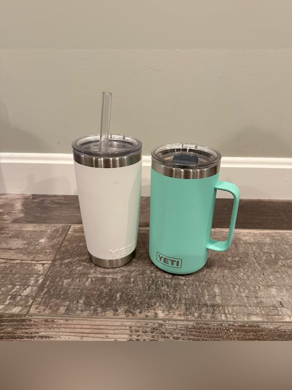 Lot of 2 Yeti Tumblers: White 20 Oz with Straw Top; Handled 24 Oz Aqua